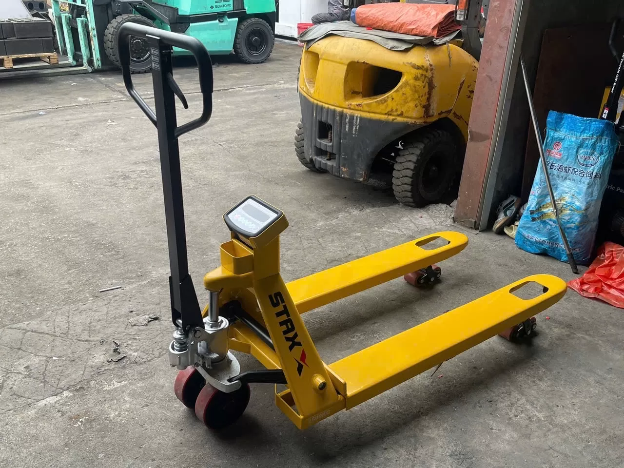 Xe nâng tay gắn cân hiệu STAXX